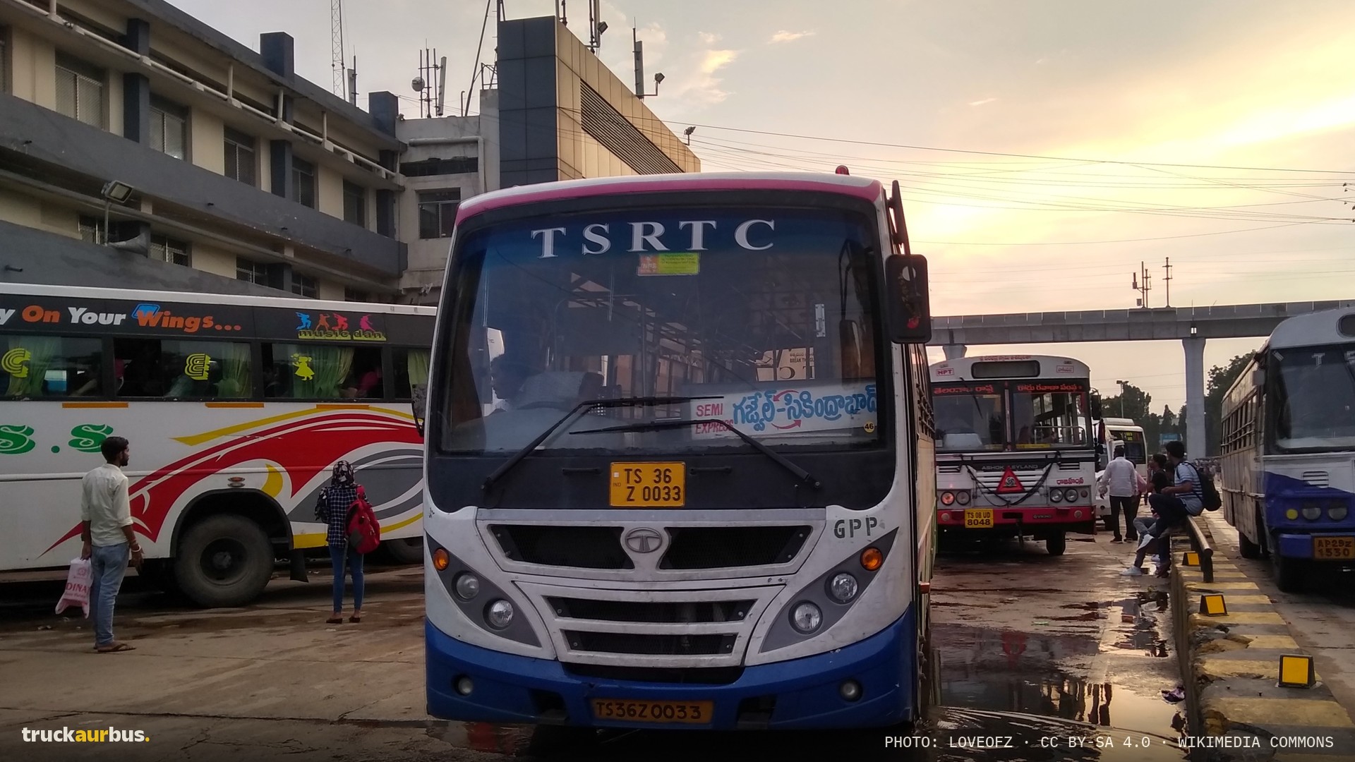Own bus with temporary driver and conductor waiting for platform at JBS - TSRTC