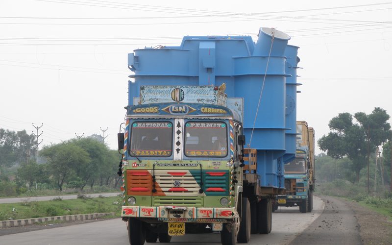 Truck carrying a large load in Indore (front view)